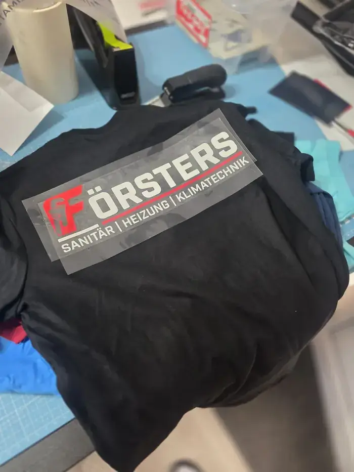 Arbeitsjacke mit Firmenlogo für einen Sanitär- und Heizungsbetrieb